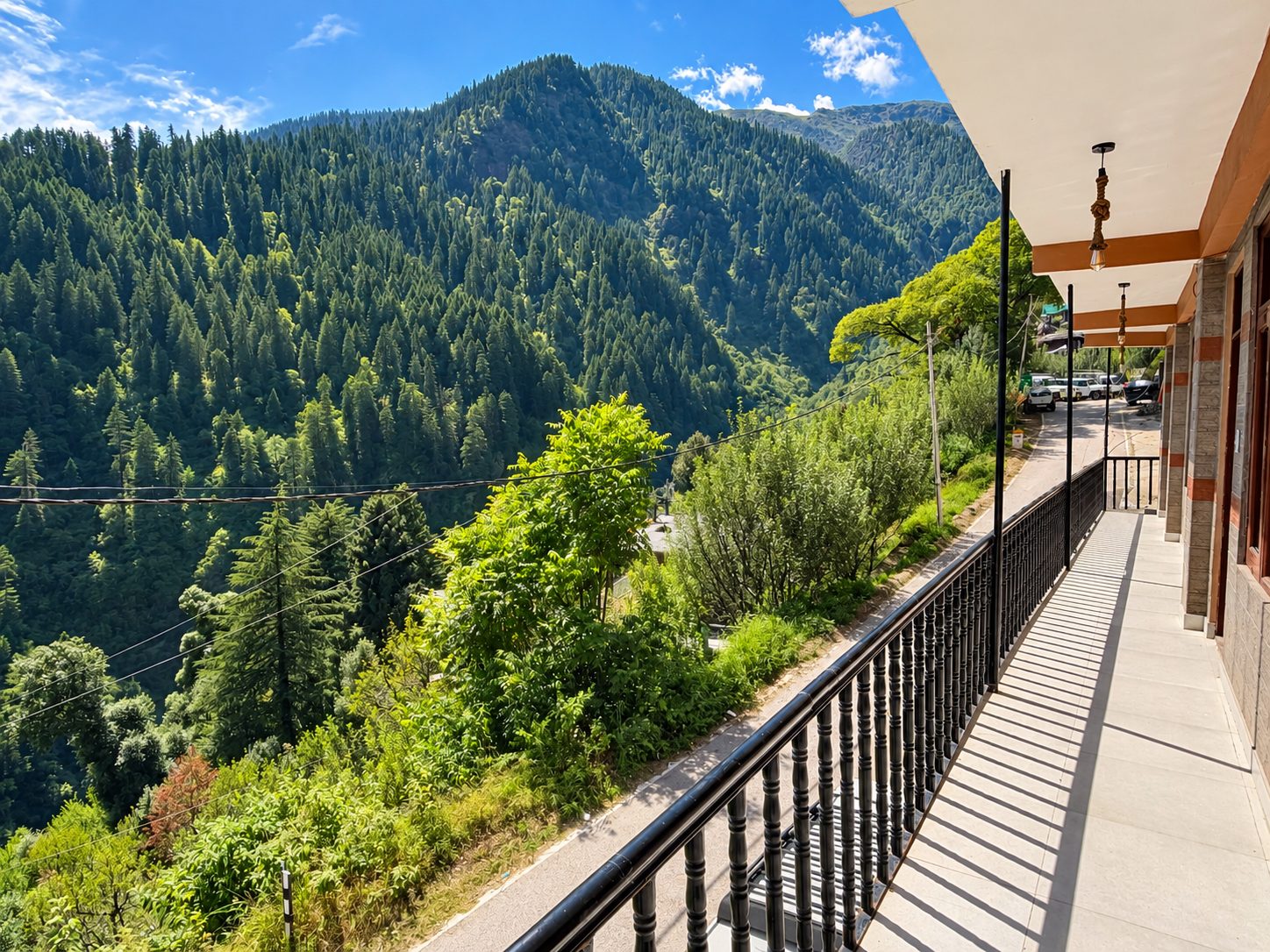 Balcony walkway above the forested mountainside