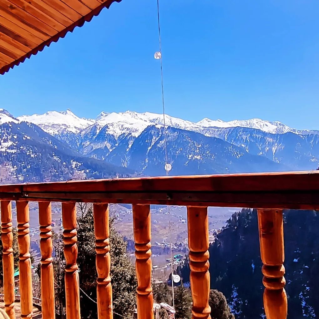 Snow-capped Himalayan peaks from Kanyal Heights
